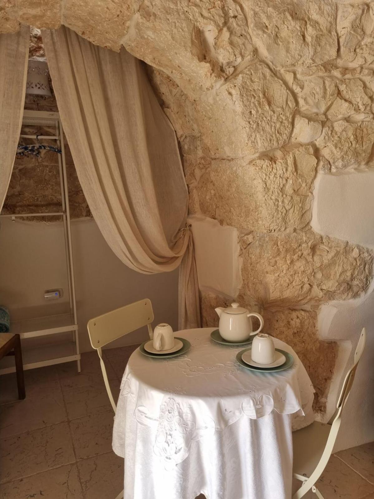 مبيت وإفطار غروتاليي Trulli Di Spinaruta المظهر الخارجي الصورة