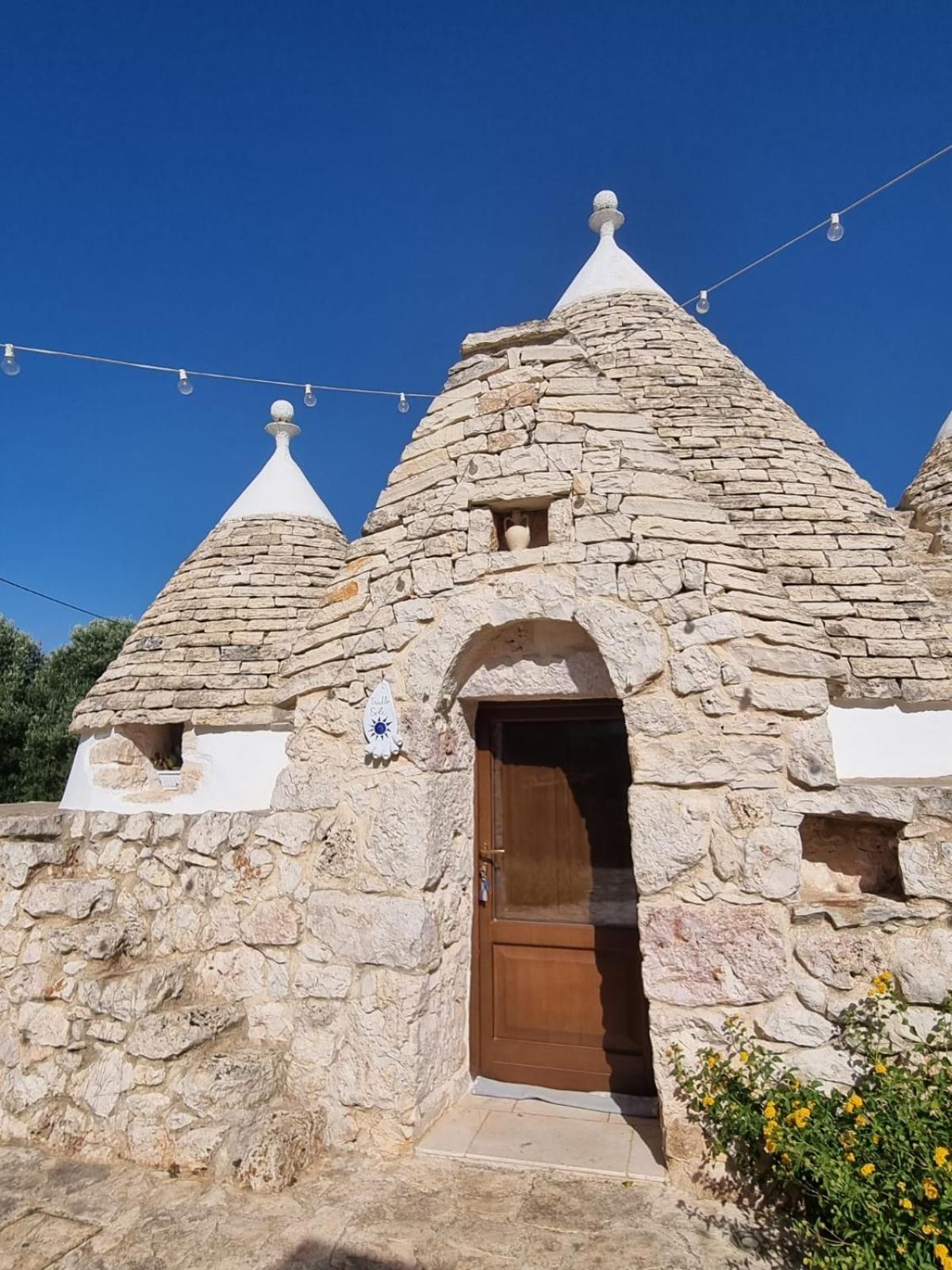 مبيت وإفطار غروتاليي Trulli Di Spinaruta المظهر الخارجي الصورة
