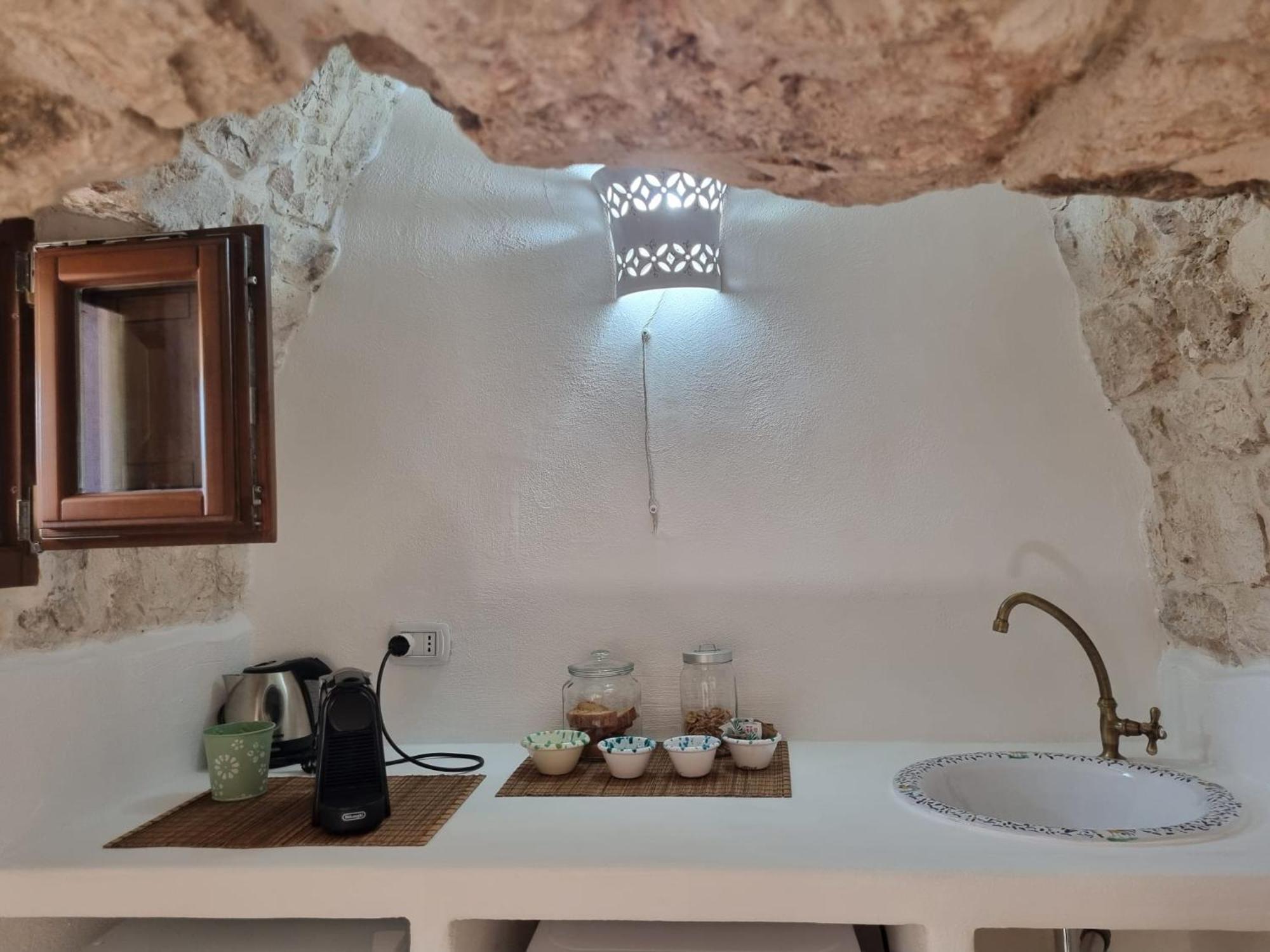 مبيت وإفطار غروتاليي Trulli Di Spinaruta المظهر الخارجي الصورة