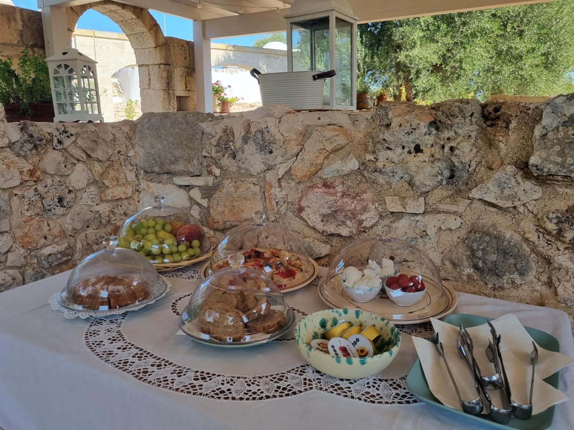 مبيت وإفطار غروتاليي Trulli Di Spinaruta المظهر الخارجي الصورة